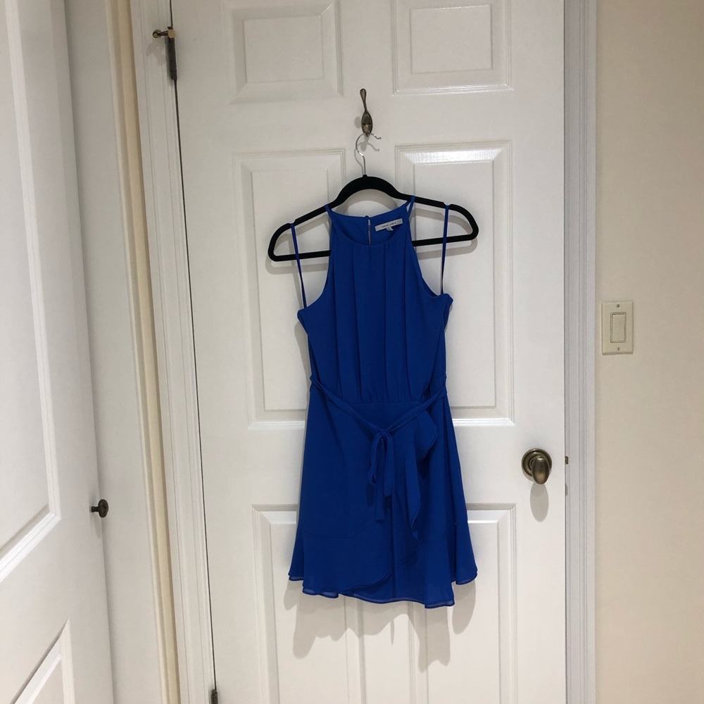 Naked Zebra halter neckline ruffle hem dress